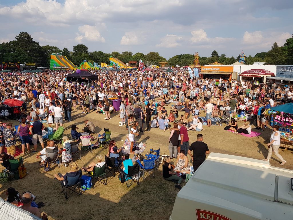 A group of people coming together to attend the river festival